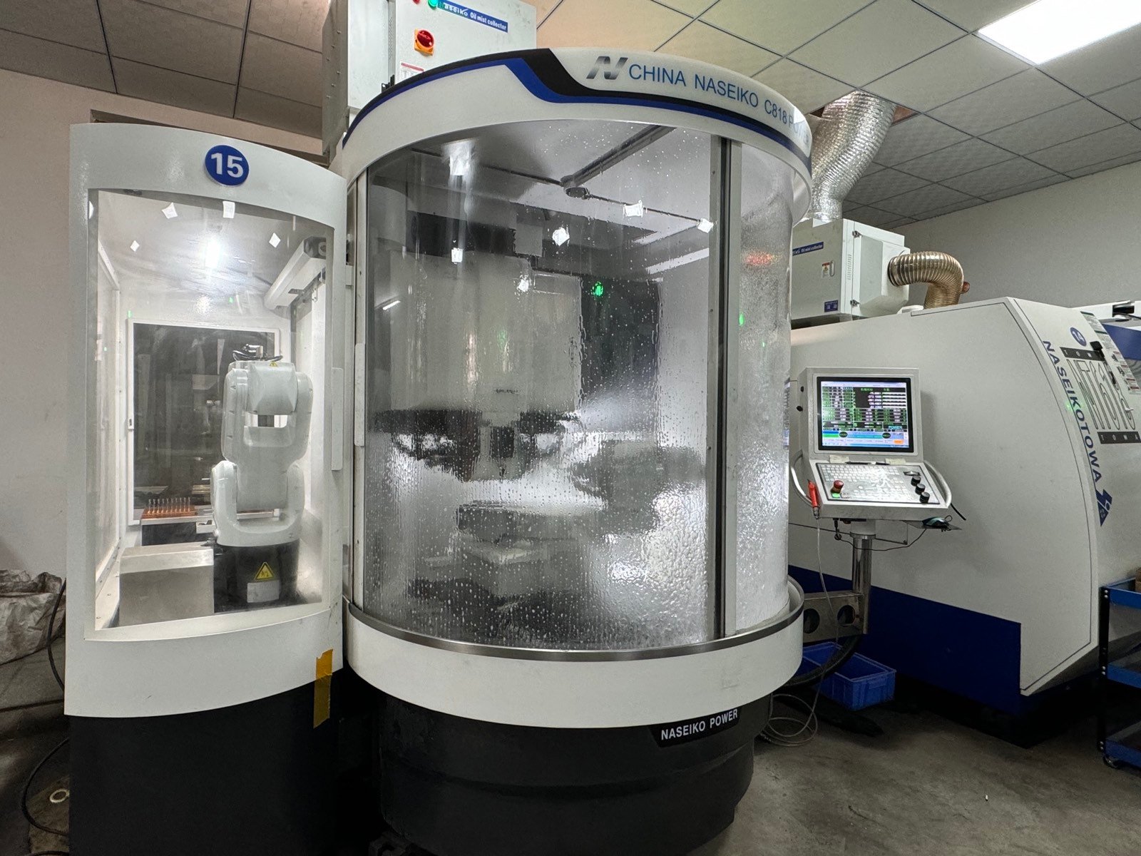 CNC production cell with enclosed equipment and automation in the YINGBA factory